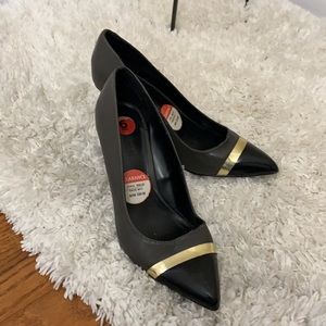 New grey and black pumps